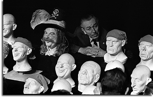 Walt Disney with unfinished heads from Pirates of the Caribbean